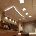 Innovative-False-Ceiling-Designs-for-Modern-Bedroom-with-Oak-Bed-and-White-Bedding-near-Teak-Desk-1024x757